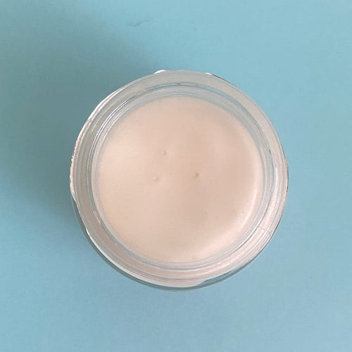 Jar of mousturising cream for face, hand and body made from all natural ingredients.